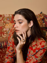 Load image into Gallery viewer, Model wearing various Elizabeth Allardyce Stacker Rings and Obelisk Earrings